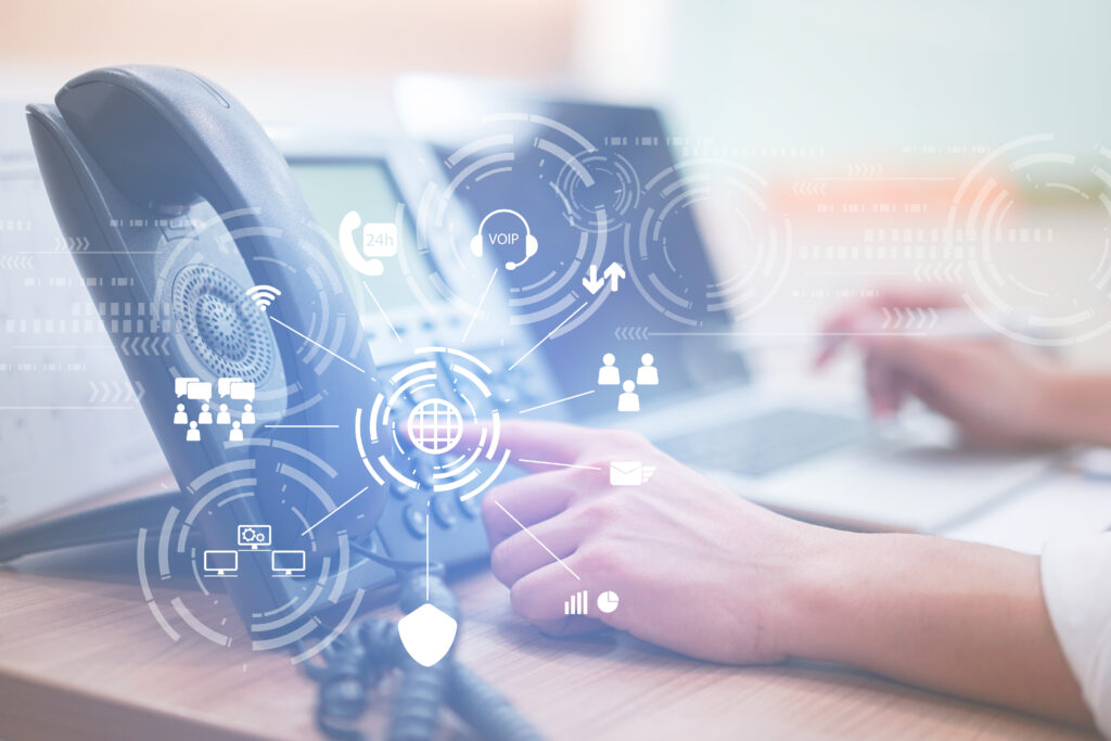 Hand dialing a business desk telephone
