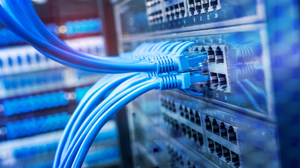 Ethernet cables connected to network switches