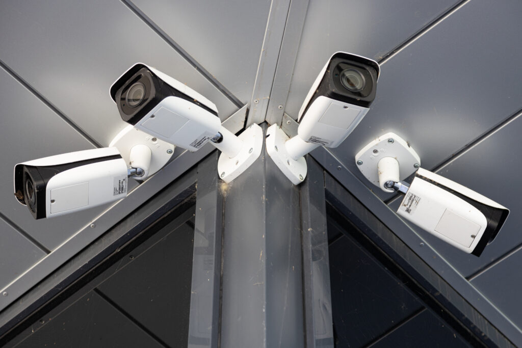 Security cameras mounted on a building corner