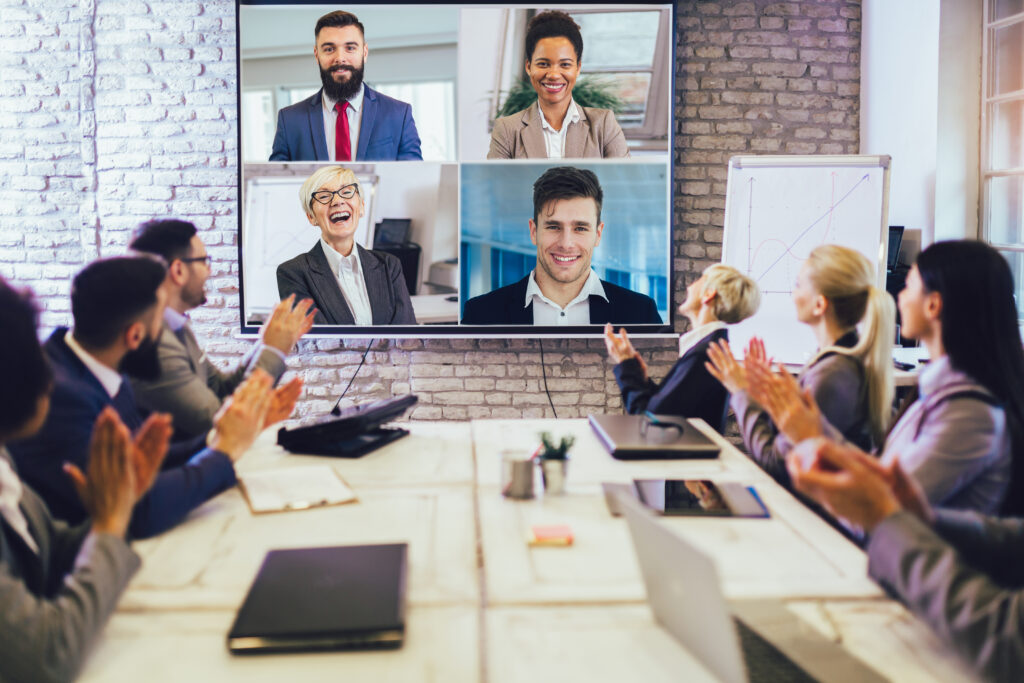 Team in a conference room on a video call